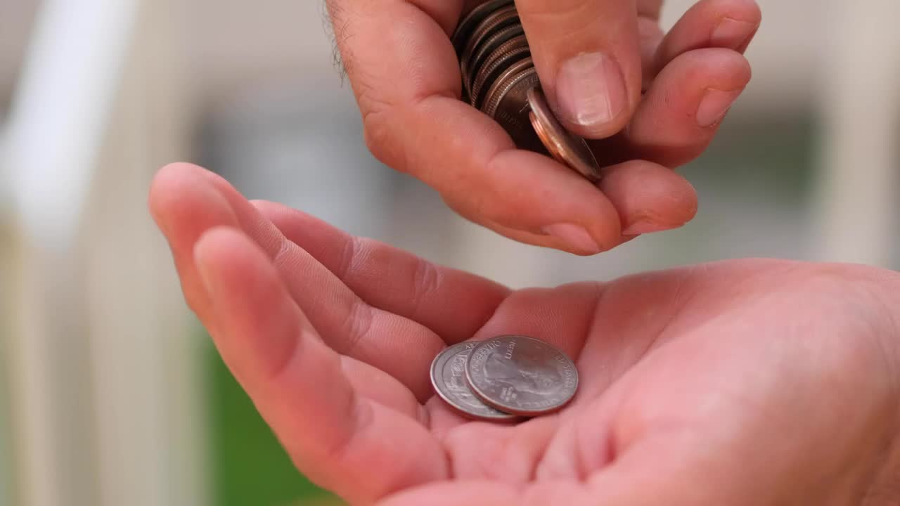 Stock Video Hands Of A Man Counting Coins Close Up View Animated Wallpaper