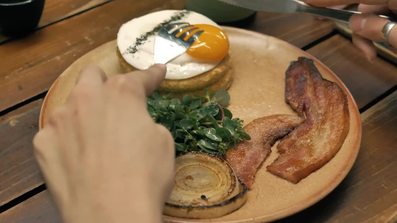 Stock Video Hands Of A Girl With Cutlery Eating In A Restaurant Animated Wallpaper