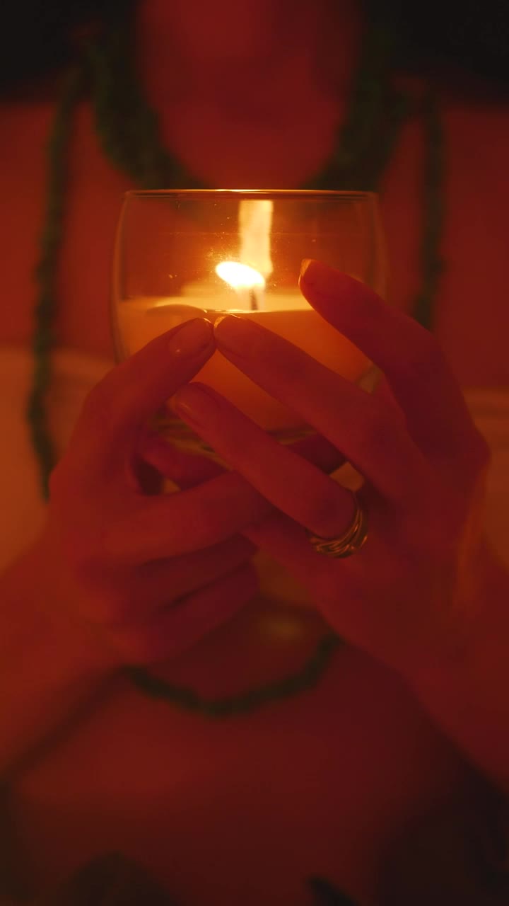 Stock Video Hands Of A Girl Holding A Candle In The Dark Animated Wallpaper