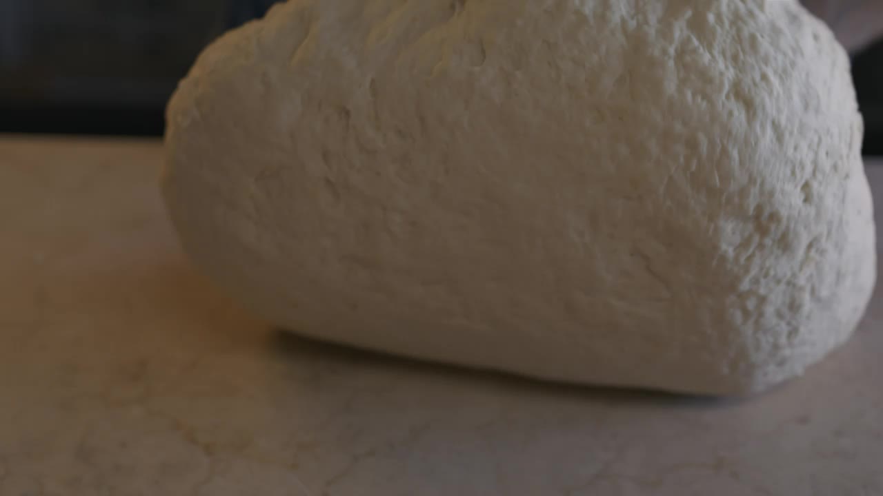 Stock Video Hands Of A Baker Kneading A Dough Animated Wallpaper