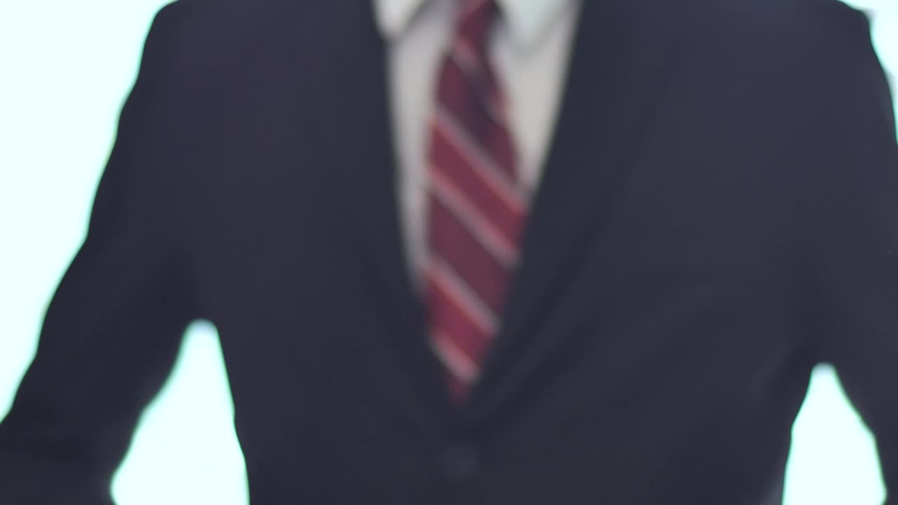 Stock Video Hands In A Handshake With A Person In A Suit Animated Wallpaper