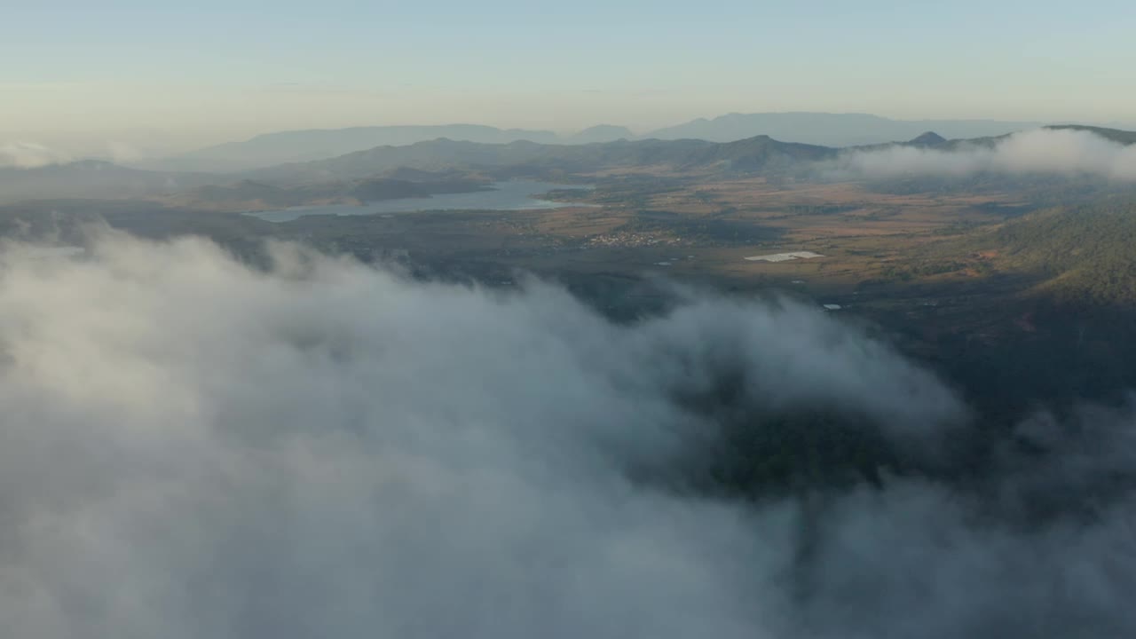 Stock Video Landscape Seen From Above Covered By Mist Animated Wallpaper