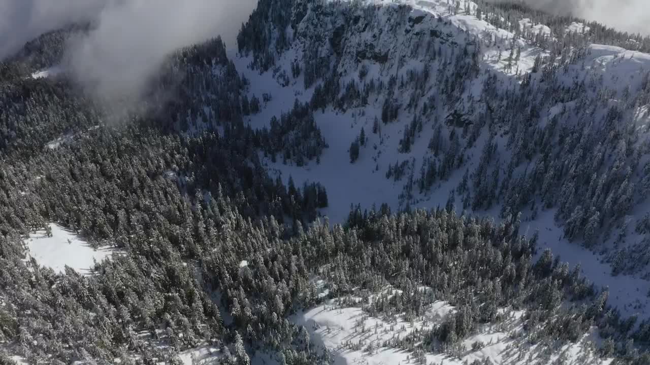 Stock Video Landscape Of Snowy Mountains Covered By Mist Animated Wallpaper