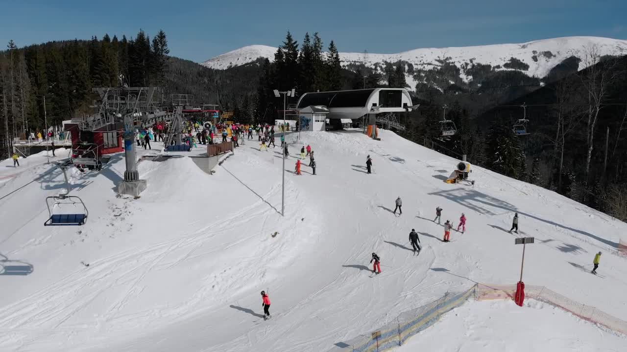 Stock Video Landscape Of Sky Lifts And Skiers In The Hill Animated Wallpaper