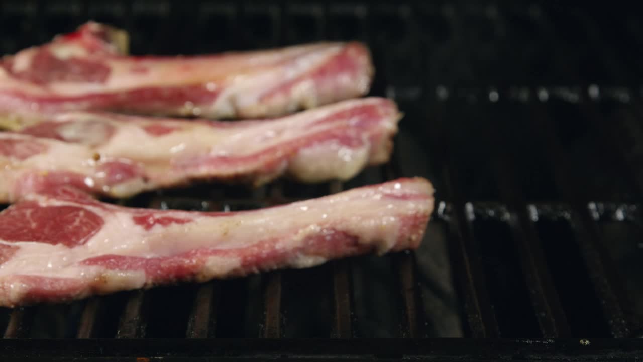 Stock Video Lamb Chops With Butter On The Fire Animated Wallpaper