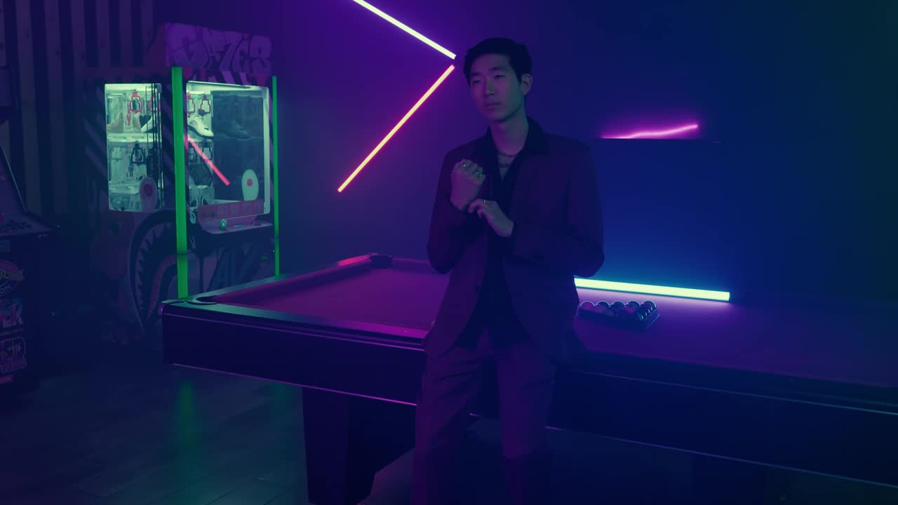 Stock Video Man In Ornate Suit At The Edge Of A Pool Animated Wallpaper