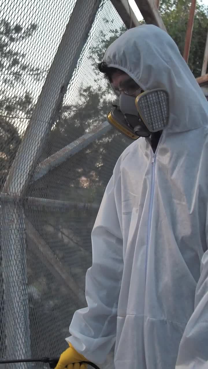 Stock Video Man In Hazmat Suit Animated Wallpaper