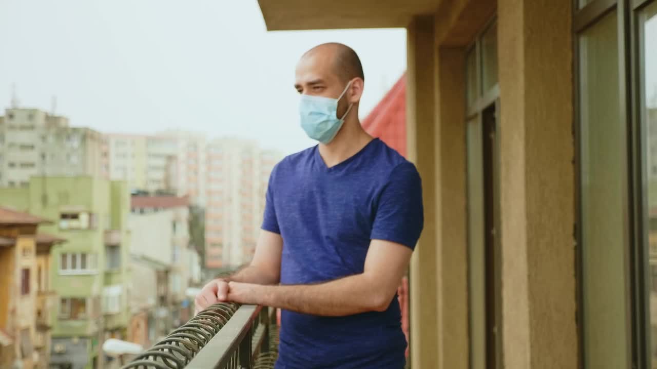 Stock Video Man In Coronavirus Lockdown Hangs Head On Balcony Animated Wallpaper