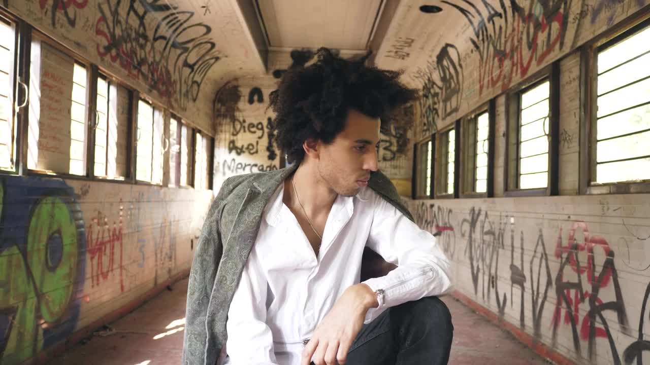 Stock Video Man In Abandoned Bus Animated Wallpaper