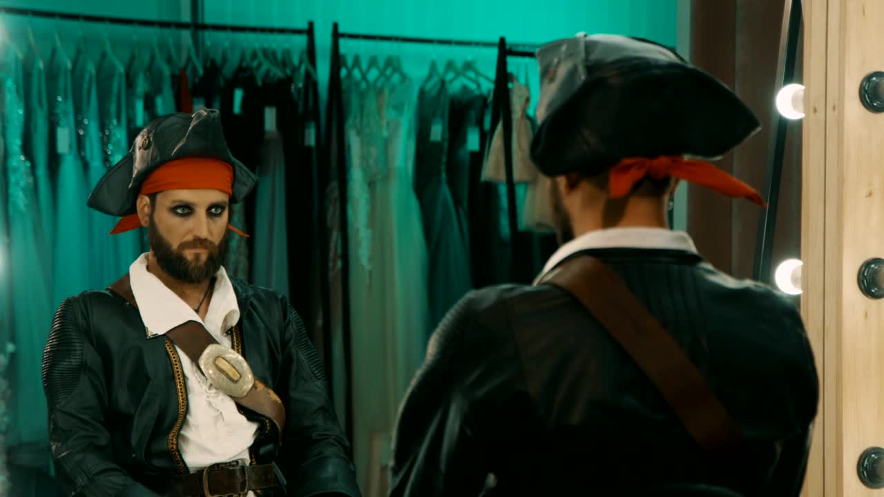 Stock Video Man In A Costume In Front Of A Mirror Animated Wallpaper