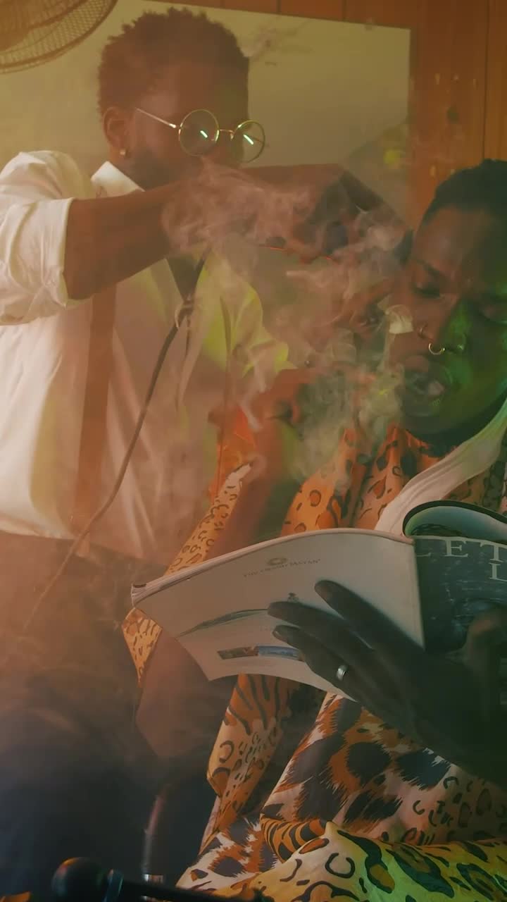 Stock Video Man In A Barbershop Smoking And Reading A Magazine Animated Wallpaper