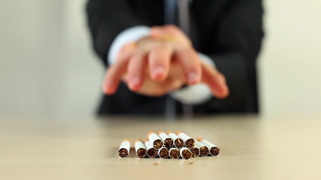 Stock Video Man Holding His Hand For Not Taking Cigarettes Animated Wallpaper