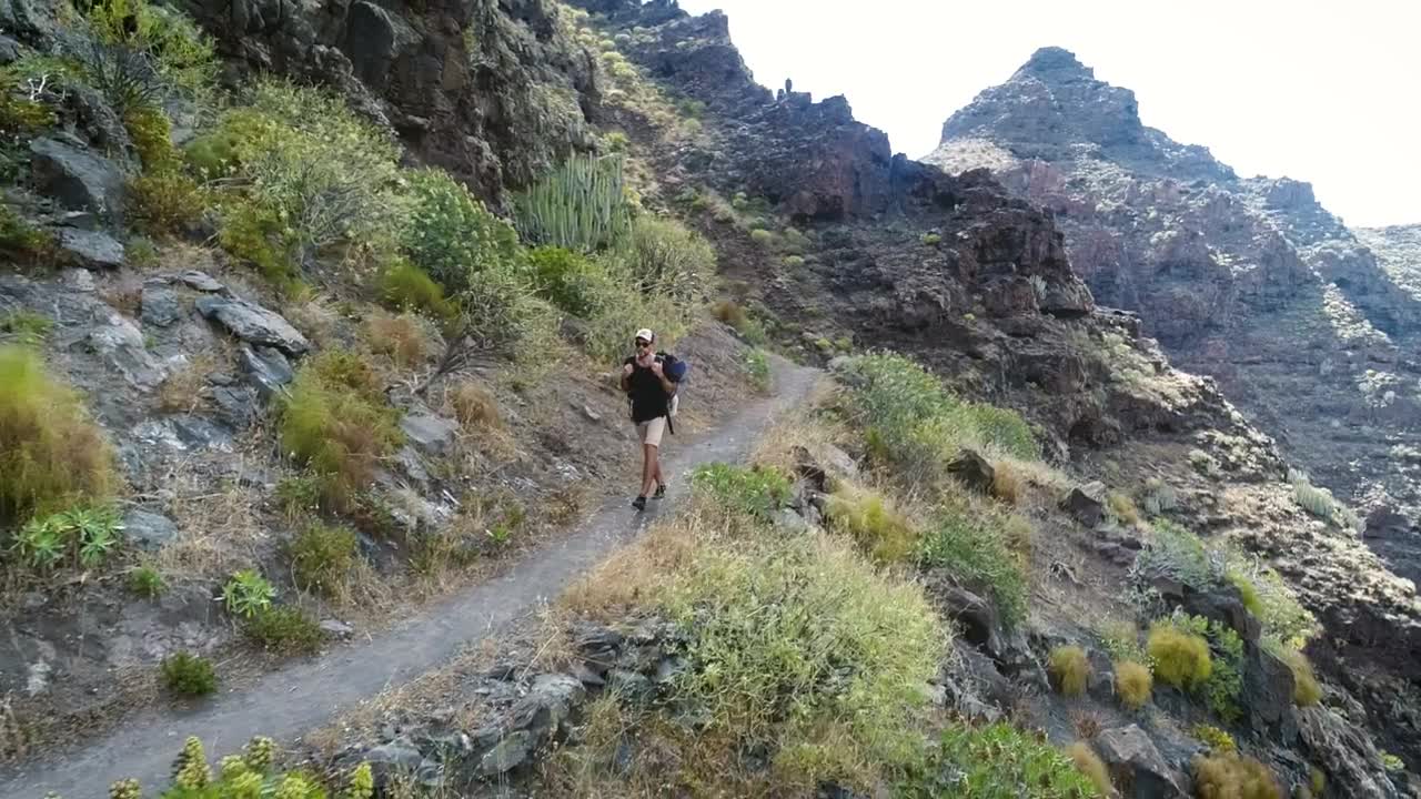 Stock Video Man Hiking In The Mountain Animated Wallpaper