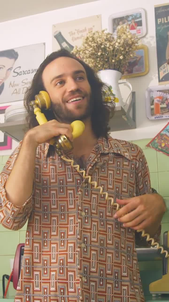 Stock Video Man Having A Phone Call At Home Animated Wallpaper