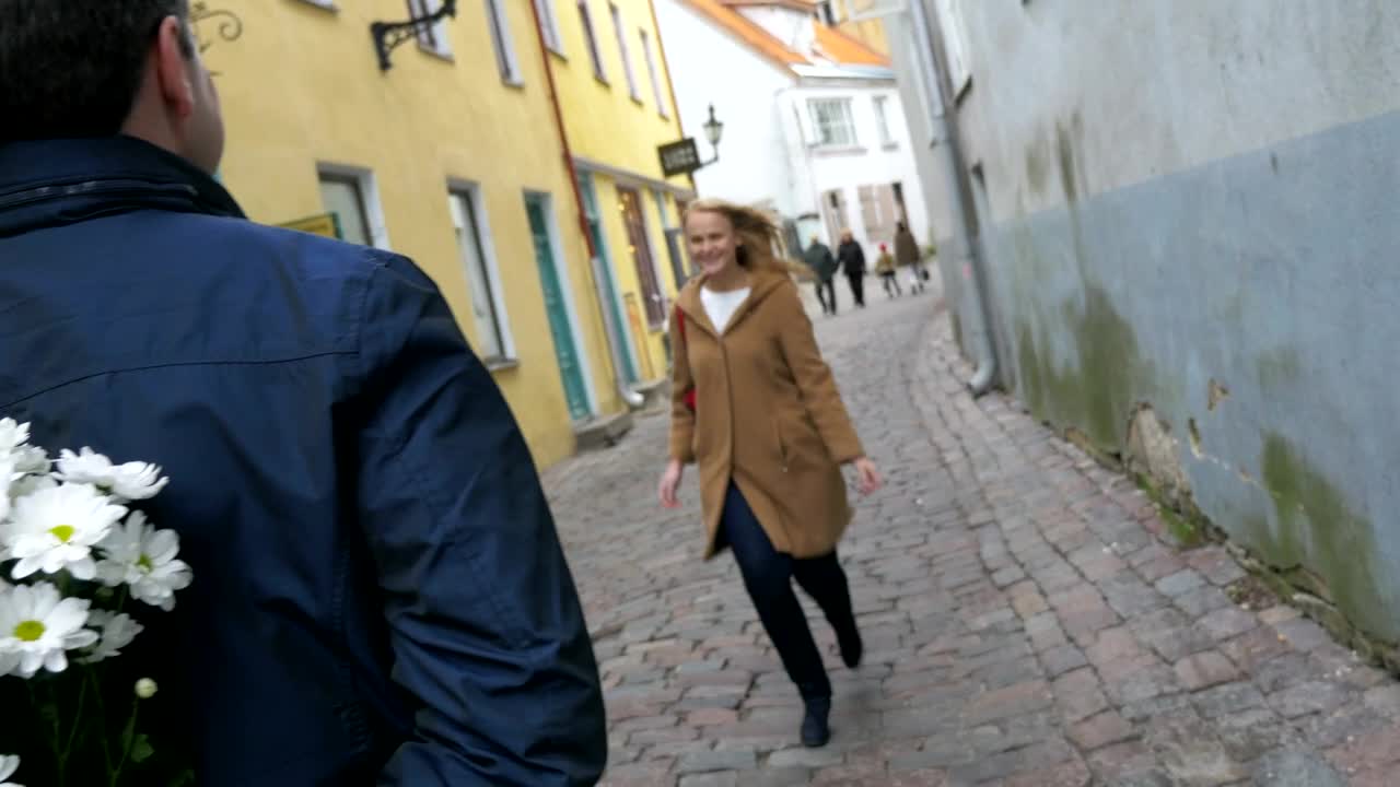 Stock Video Man Handing A Woman Flowers Animated Wallpaper