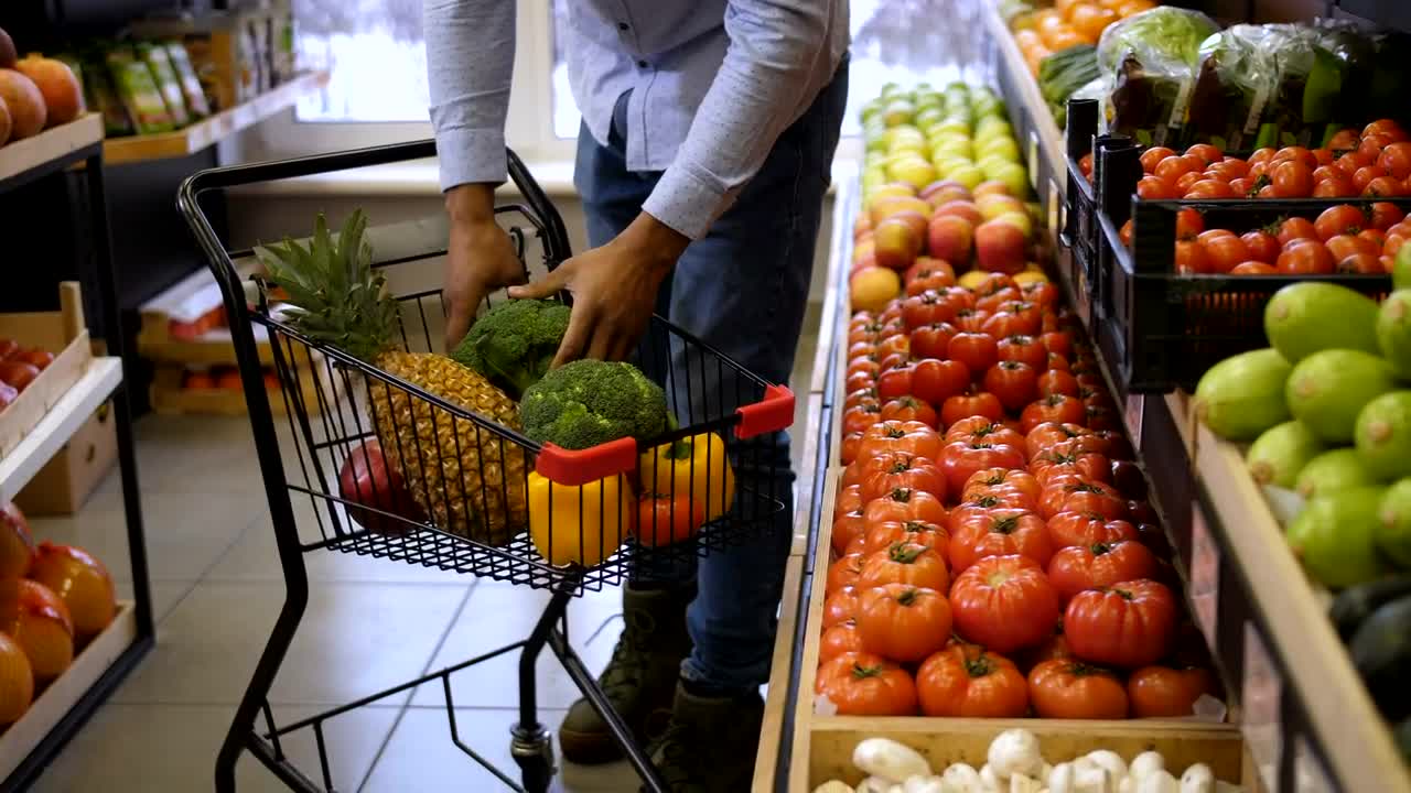 Stock Video Man Grocery Shopping Animated Wallpaper