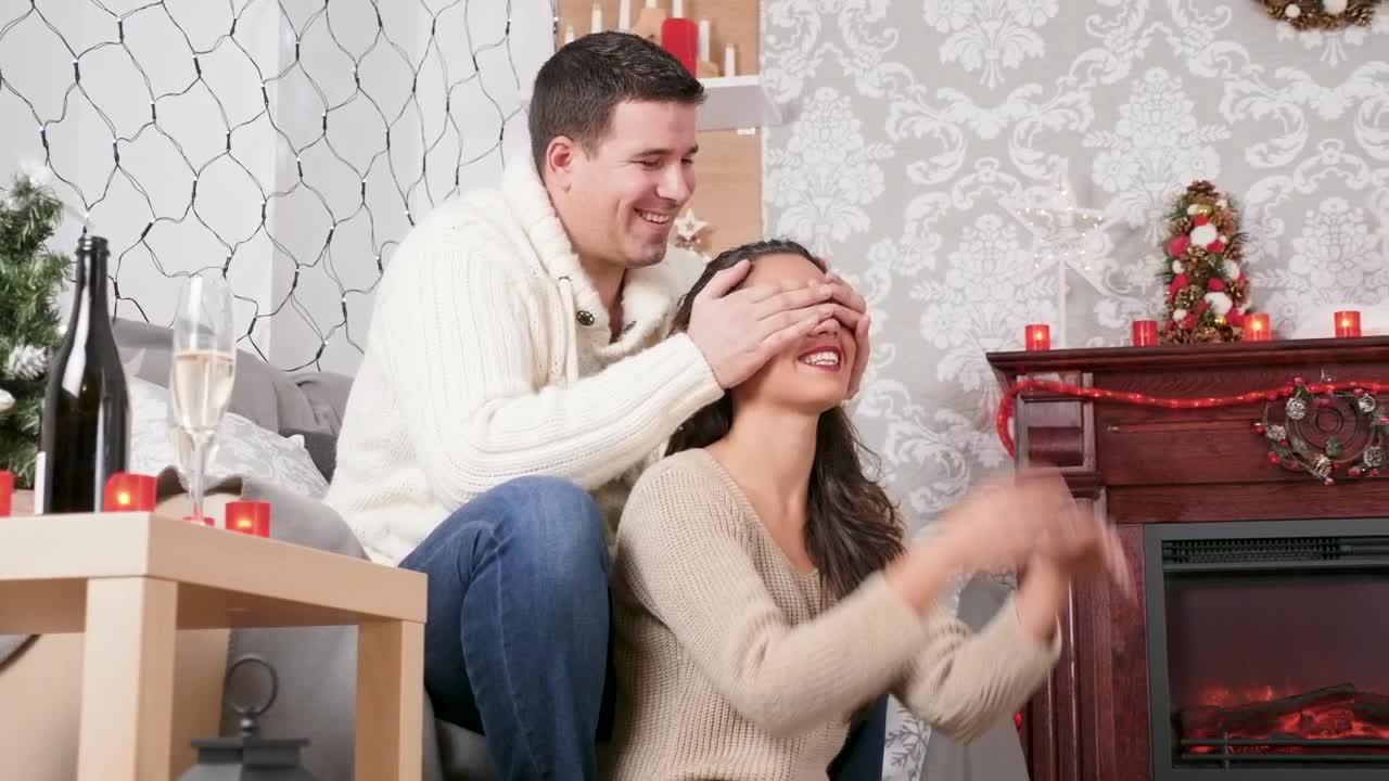 Stock Video Man Giving His Wife A Surprise Animated Wallpaper
