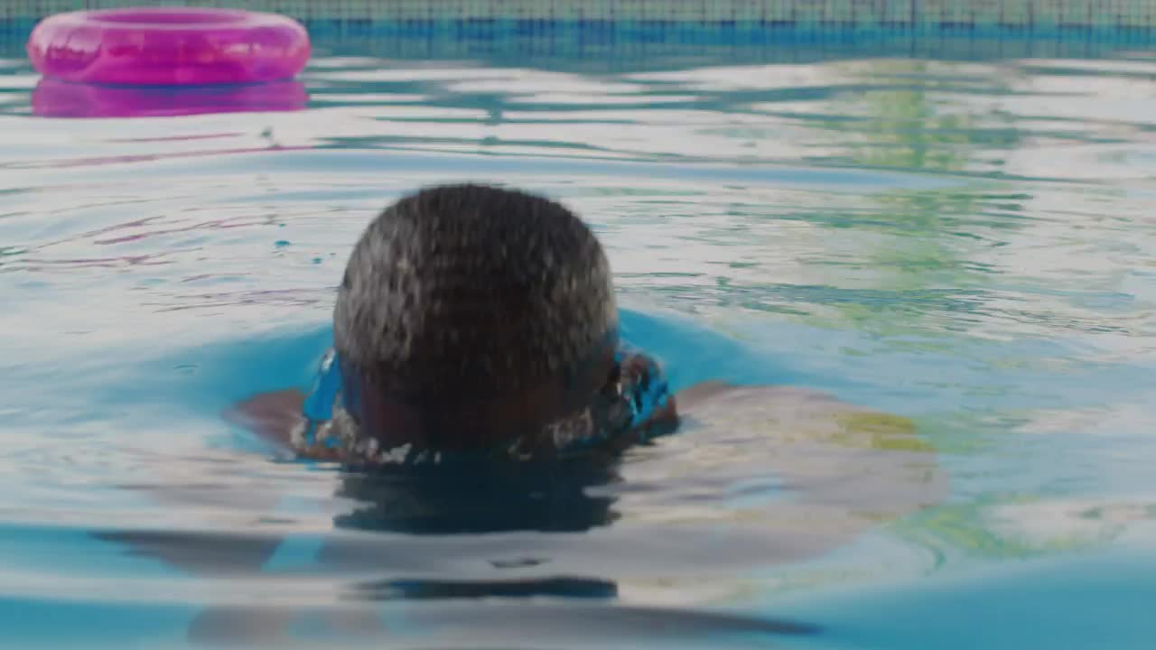 Stock Video Man Getting Out Of The Water In A Pool Animated Wallpaper