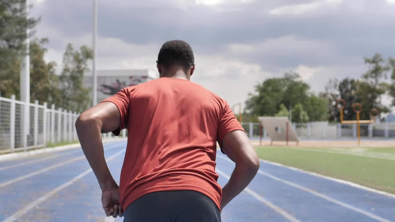 Stock Video Man From Behind Running In A Sports Center Animated Wallpaper