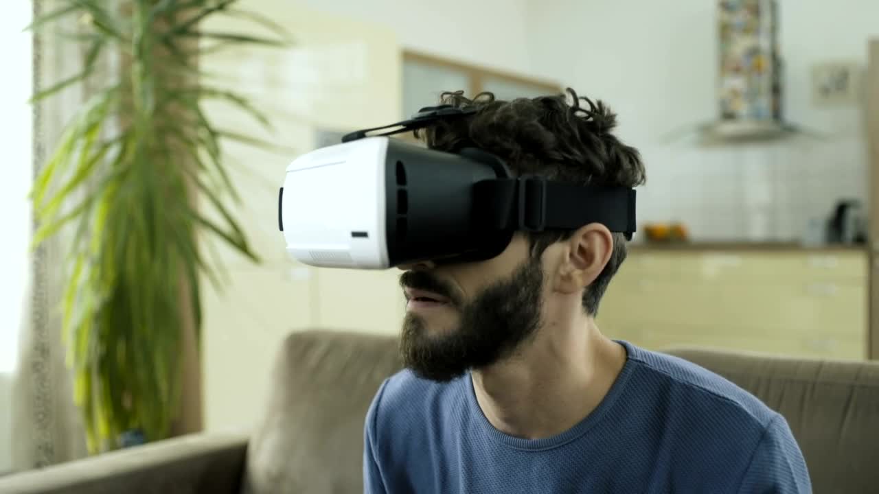 Stock Video Man Frightened With Virtual Reality Animated Wallpaper