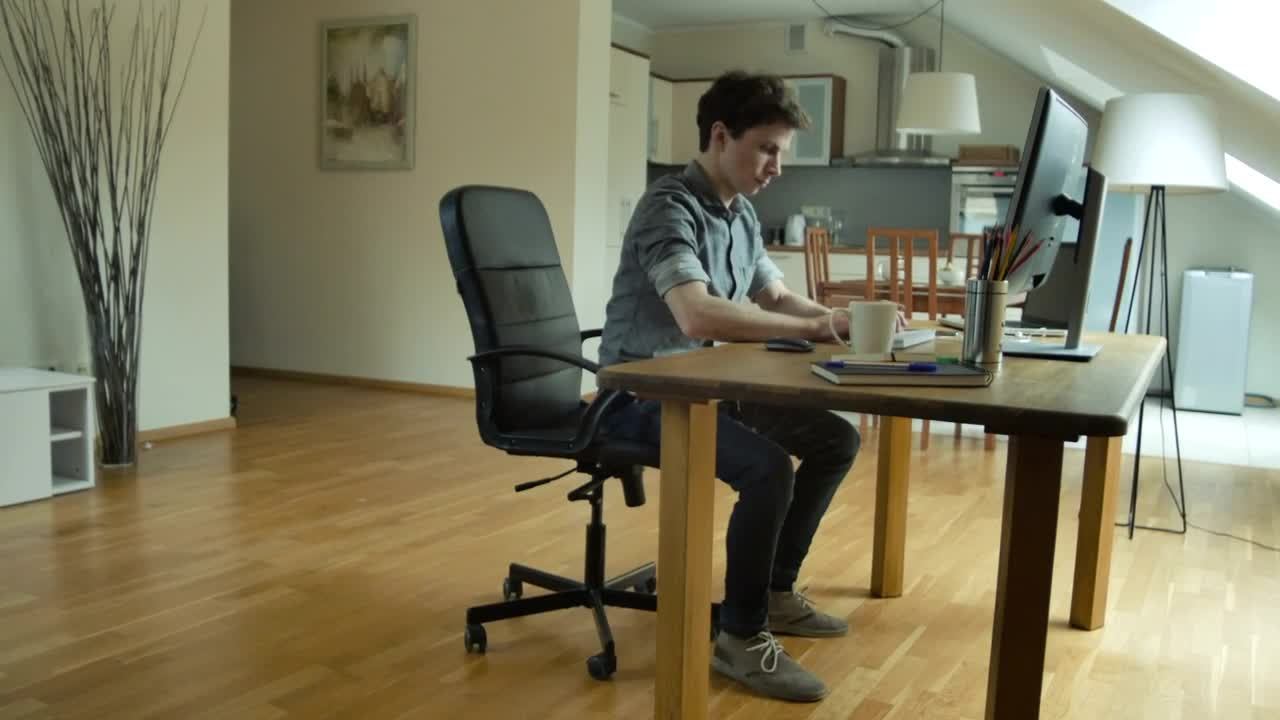 Stock Video Man Finishing Work In The Computer Animated Wallpaper