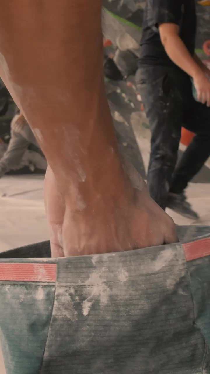 Stock Video Man Filling His Hands With Chalk To Do Mountaineering Animated Wallpaper