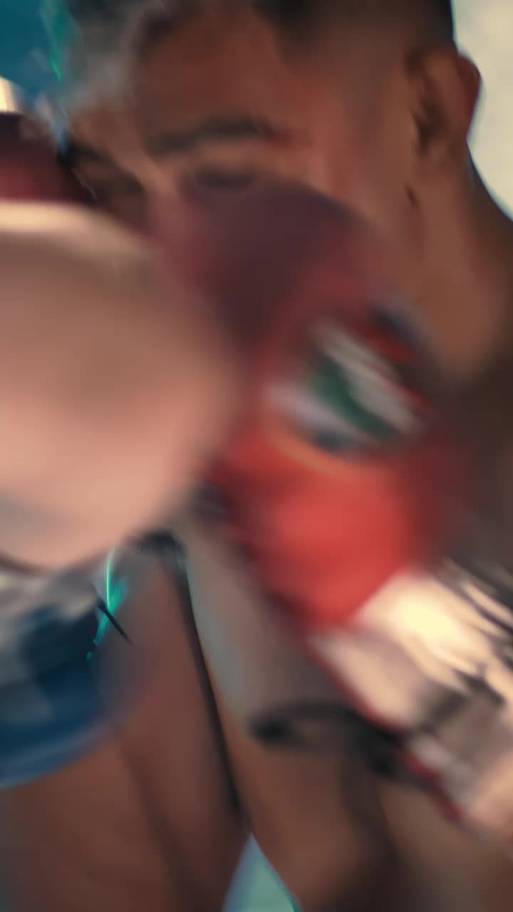 Stock Video Man Fighting Hard In A Boxing Match Animated Wallpaper