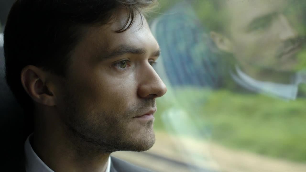 Stock Video Man Face By The Train Window Animated Wallpaper