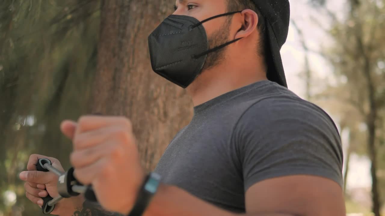 Stock Video Man Exercising With Stretching Band Animated Wallpaper