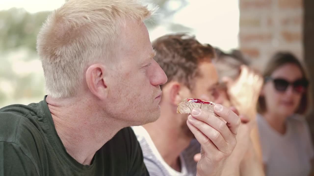 Stock Video Man Eating Breakfast Toast Animated Wallpaper