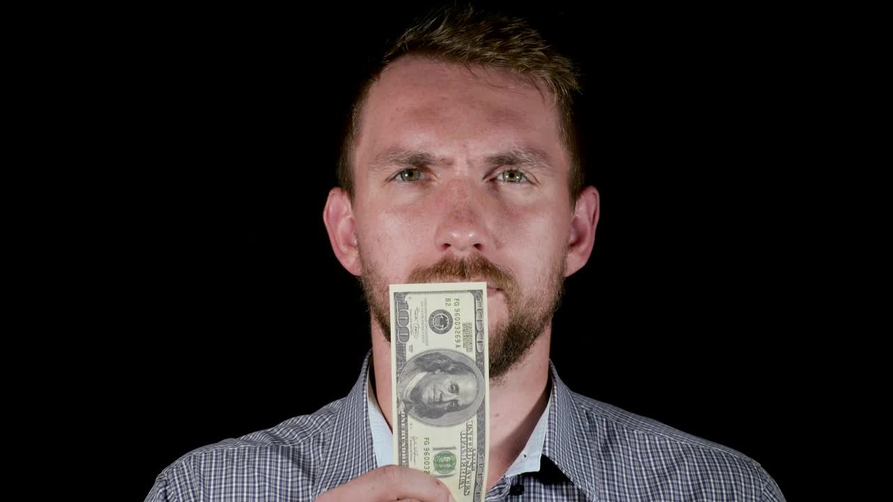 Stock Video Man Eating A Bill Animated Wallpaper