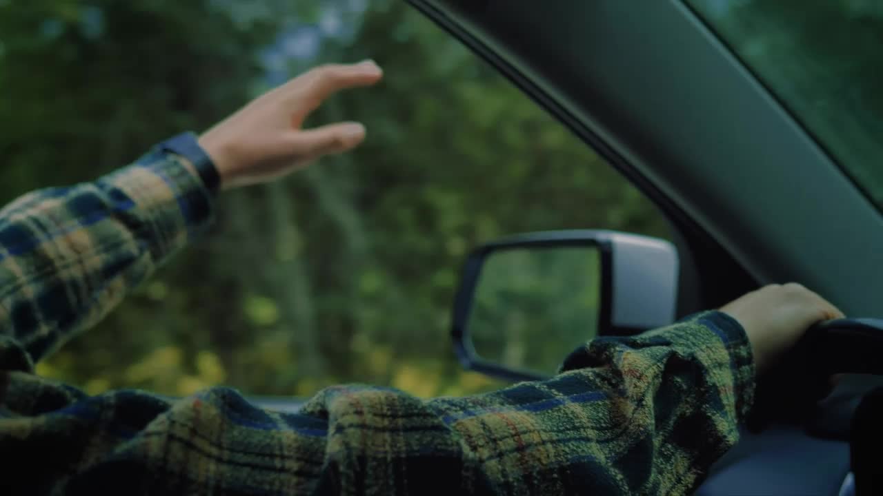 Stock Video Man Driving Through Nature Enjoying The Wind Animated Wallpaper