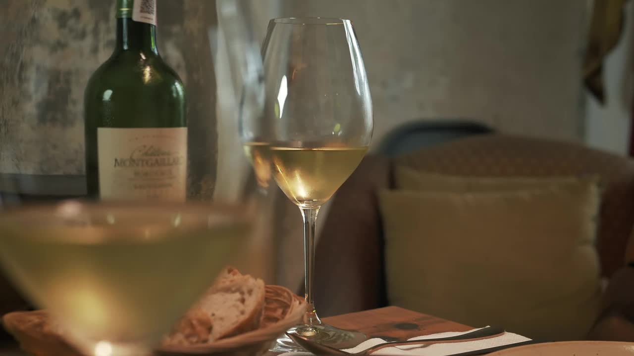 Stock Video Man Drinking Wine From A Glass During A Romantic Dinner Animated Wallpaper