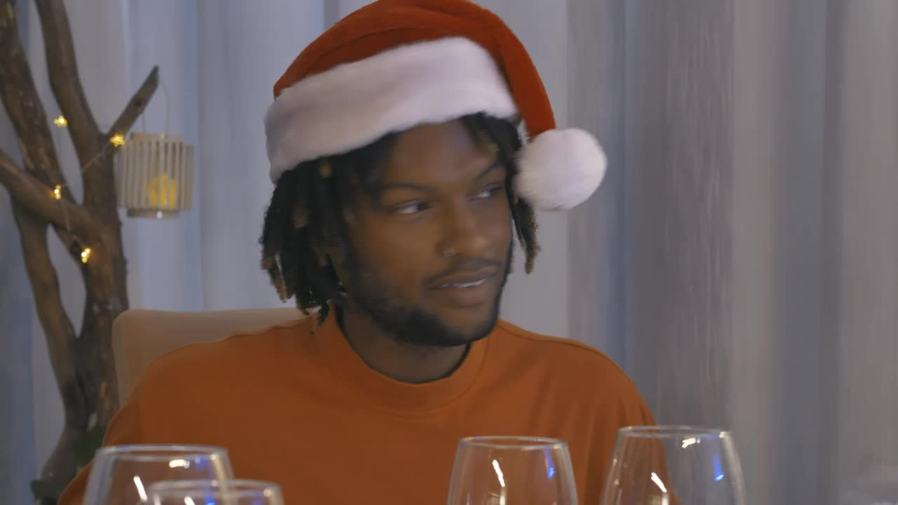 Stock Video Man Drinking Wine At Christmas Dinner Animated Wallpaper