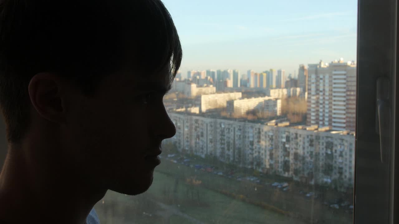 Stock Video Man Drinking Alcohol By The Window Animated Wallpaper