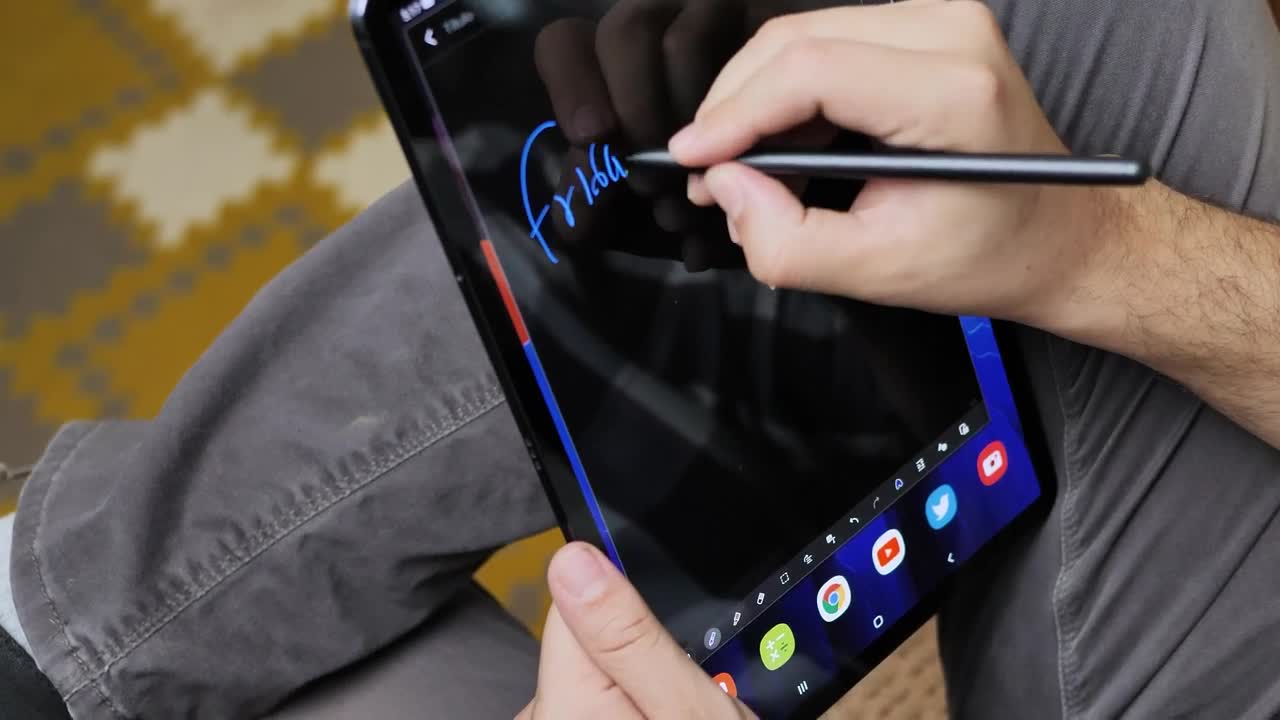 Stock Video Man Drawing On A Tablet And With A Touch Pen Animated Wallpaper