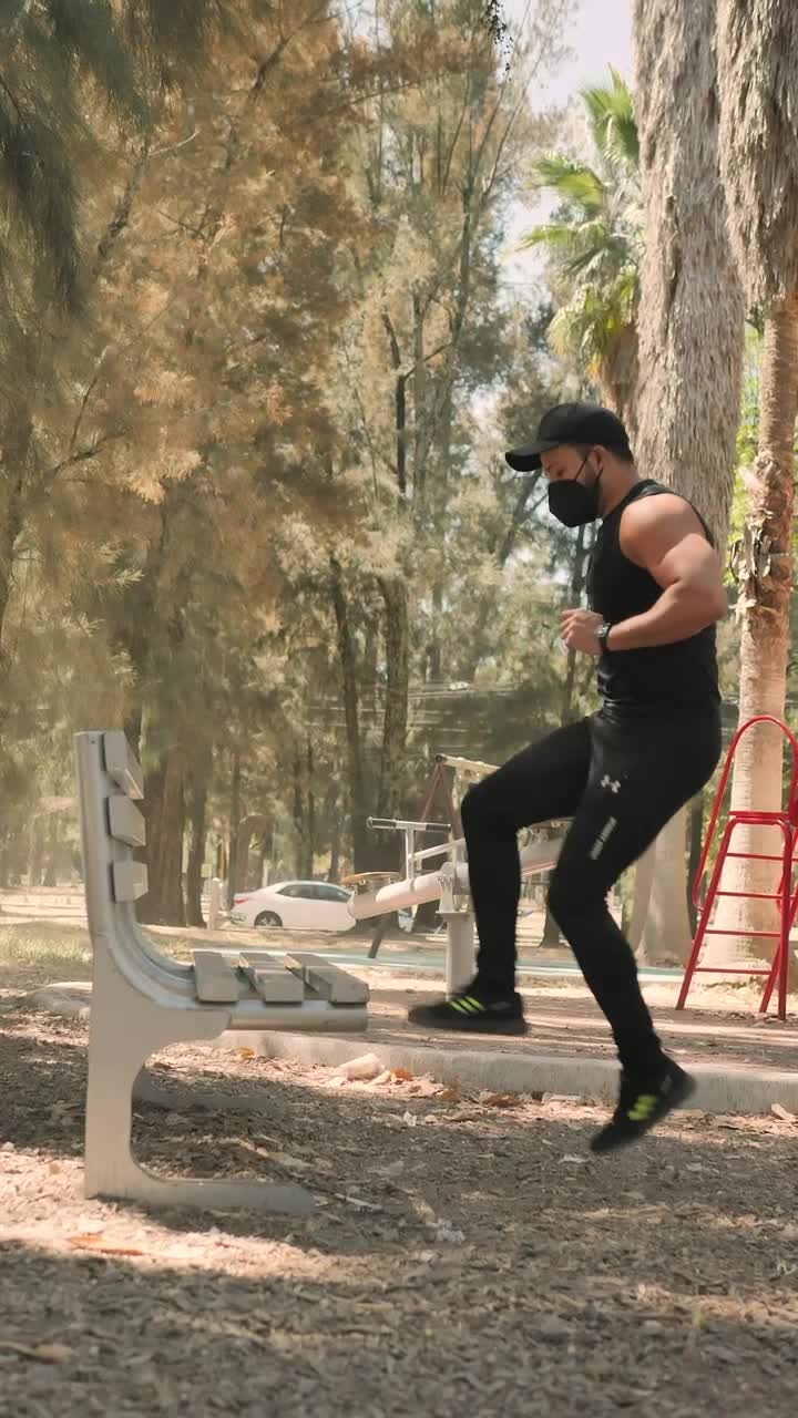 Stock Video Man Doing Workout On A Park Bench Animated Wallpaper