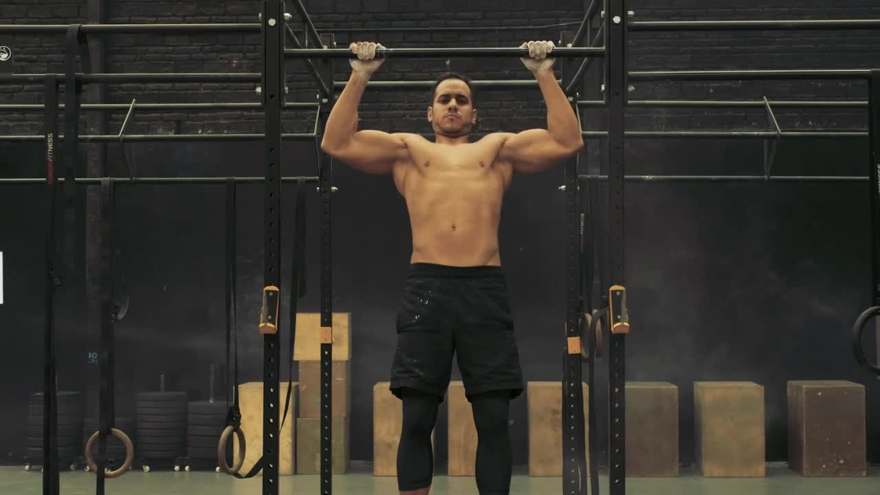 Stock Video Man Doing Pull Ups Animated Wallpaper