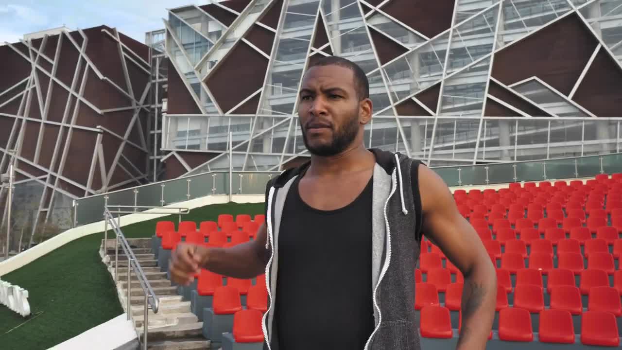 Stock Video Man Doing Arm Stretches Animated Wallpaper