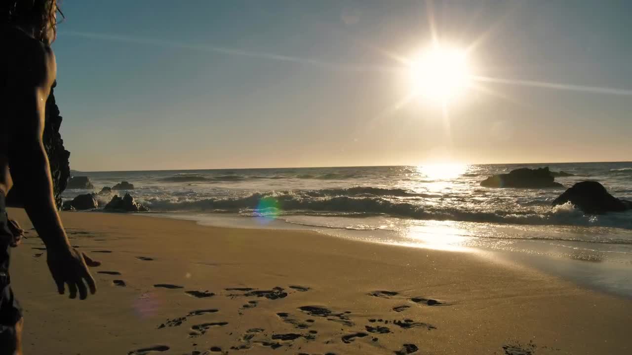 Stock Video Man Doing A Cartwheel On The Beach Animated Wallpaper