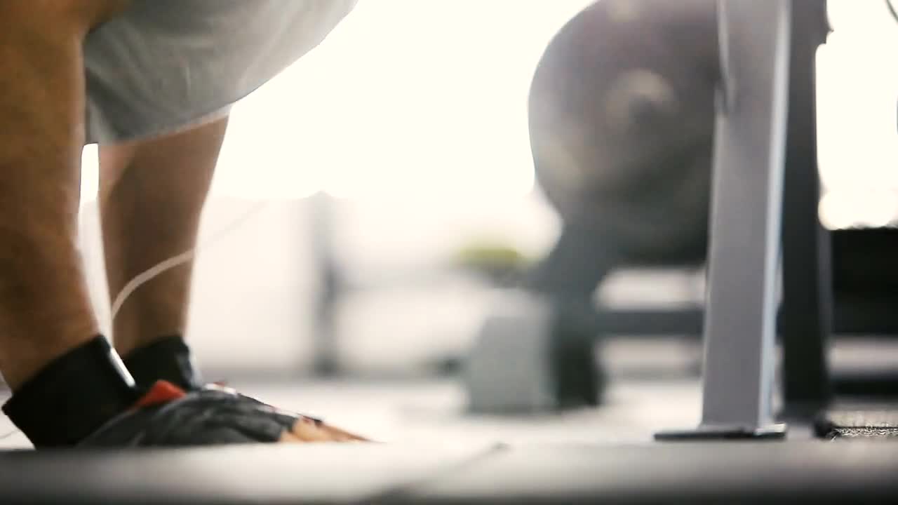 Stock Video Man Does Weight Loss Workout Pushups With Earbuds Animated Wallpaper