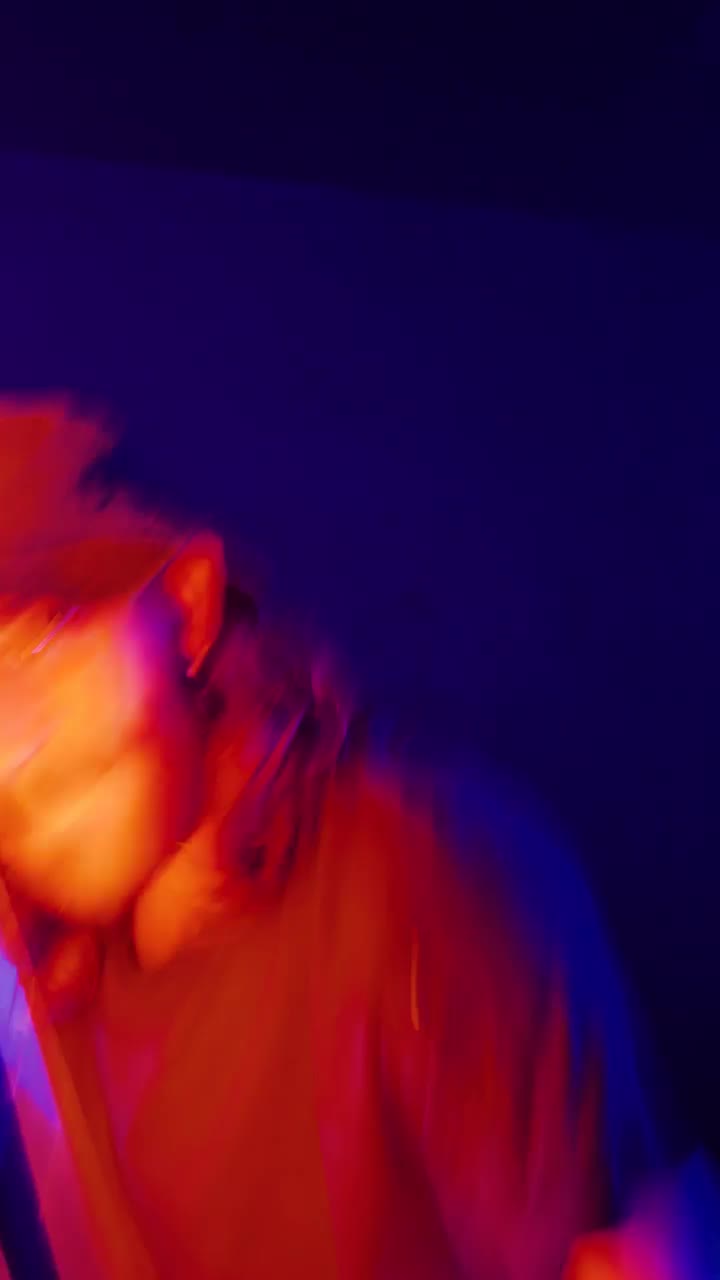 Stock Video Man Dancing With An Orange Light Bar Animated Wallpaper