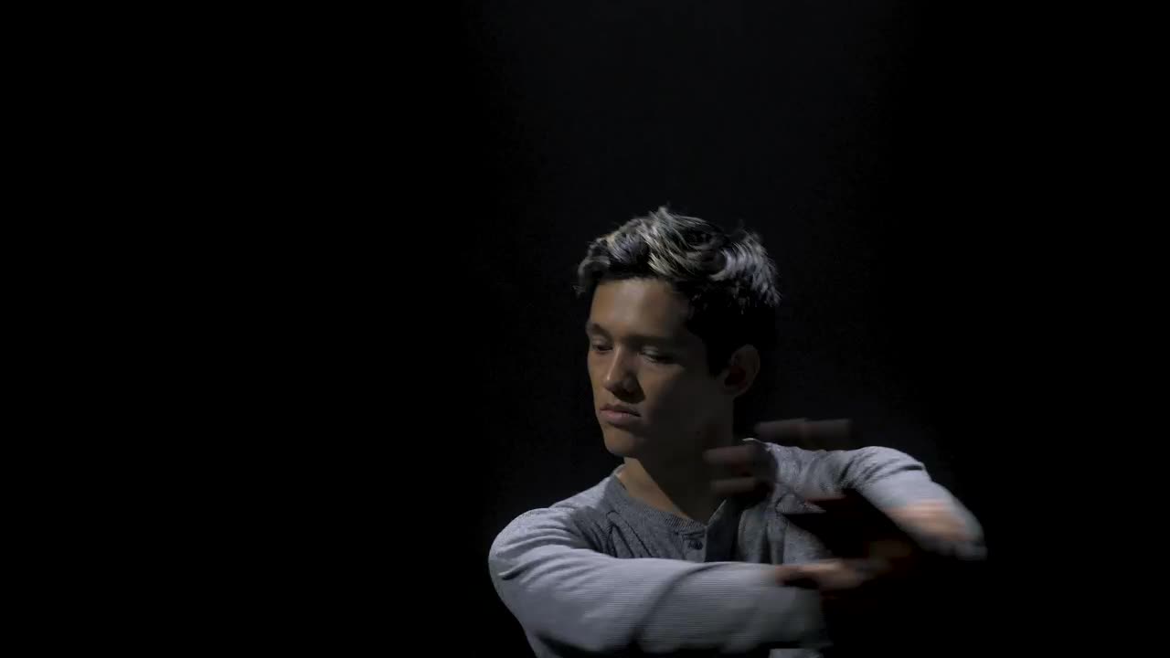 Stock Video Man Dancing Contemporary In The Dark Animated Wallpaper