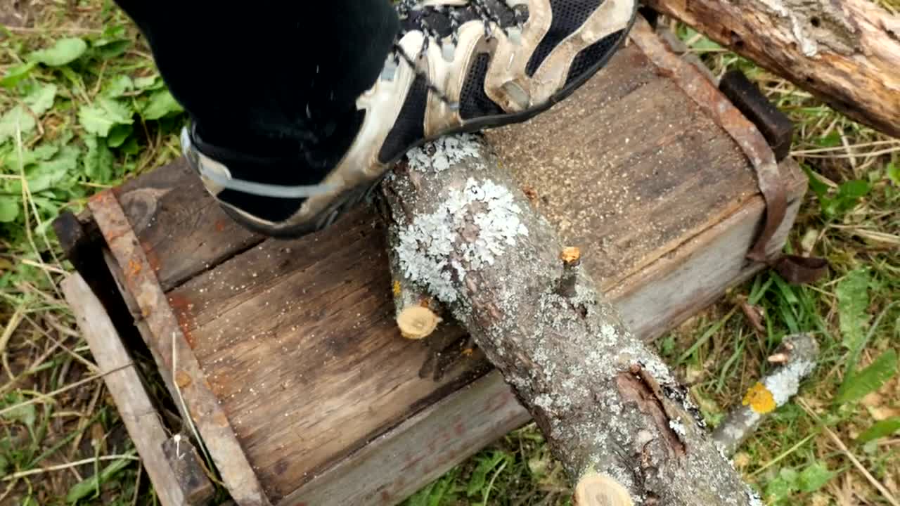 Stock Video Man Cutting Up Wood With An Electric Saw Animated Wallpaper