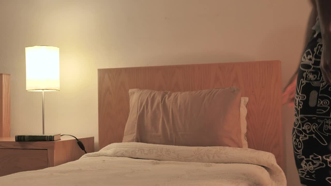 Stock Video Man Comes To His Bed To Sleep Animated Wallpaper