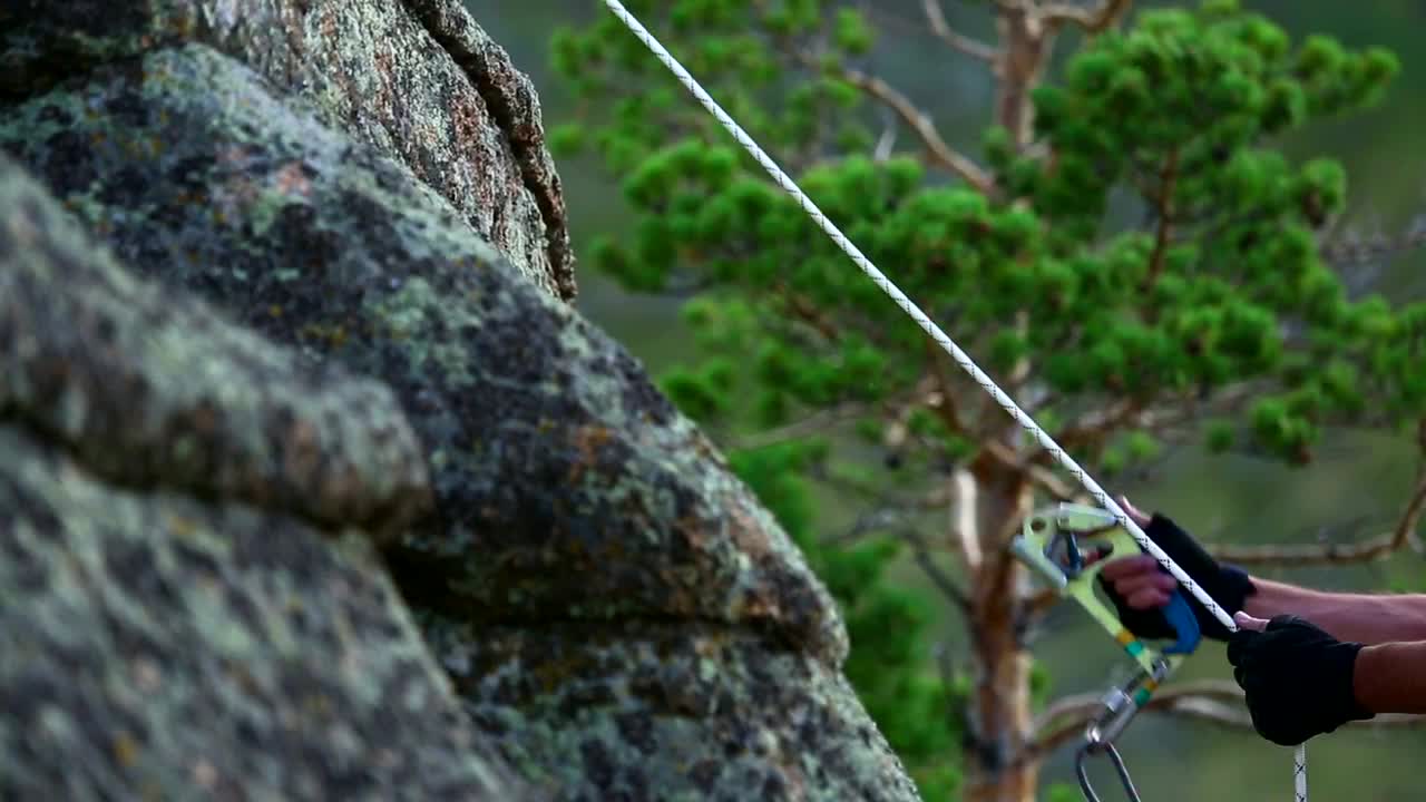 Stock Video Man Climbing A Rock Animated Wallpaper