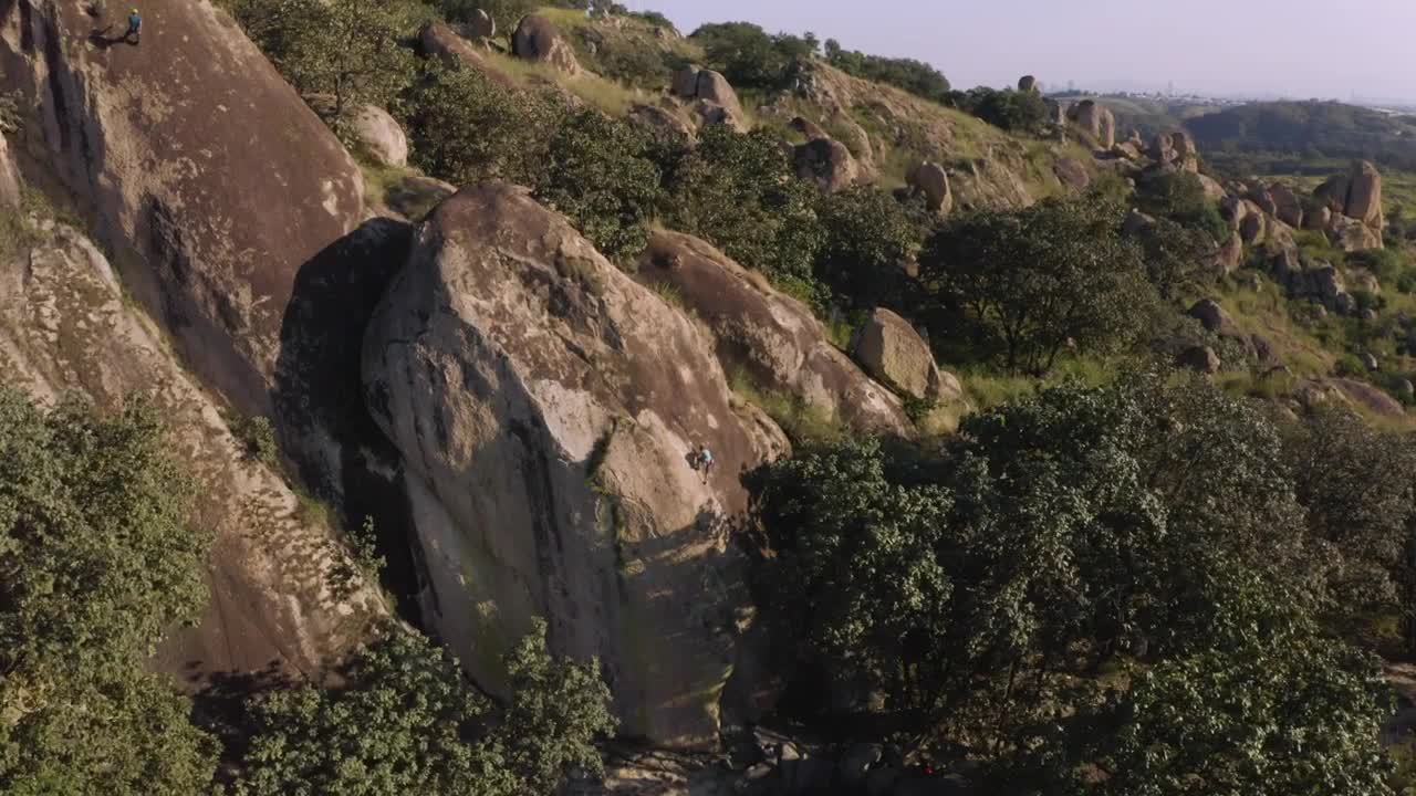Stock Video Man Climbing A Mountain Seen From Above Animated Wallpaper