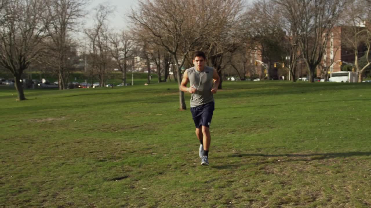 Stock Video Man Checking His Phone While Jogging Animated Wallpaper