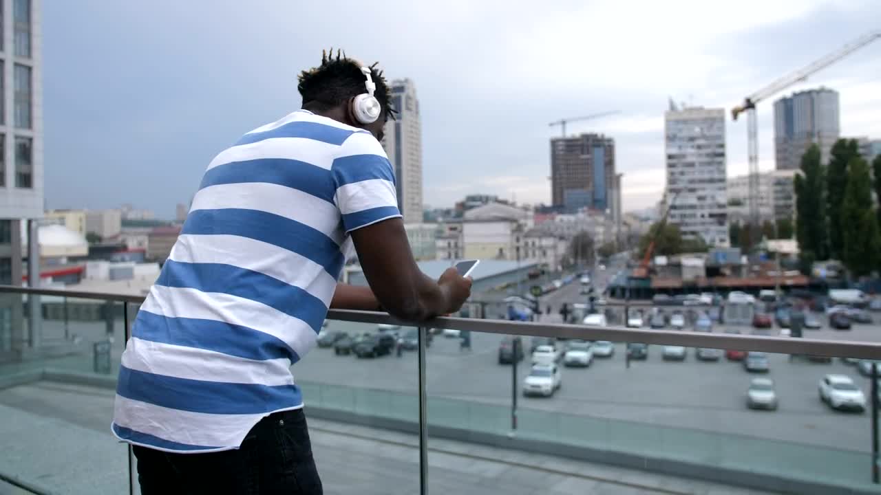 Stock Video Man Checking His Phone Animated Wallpaper