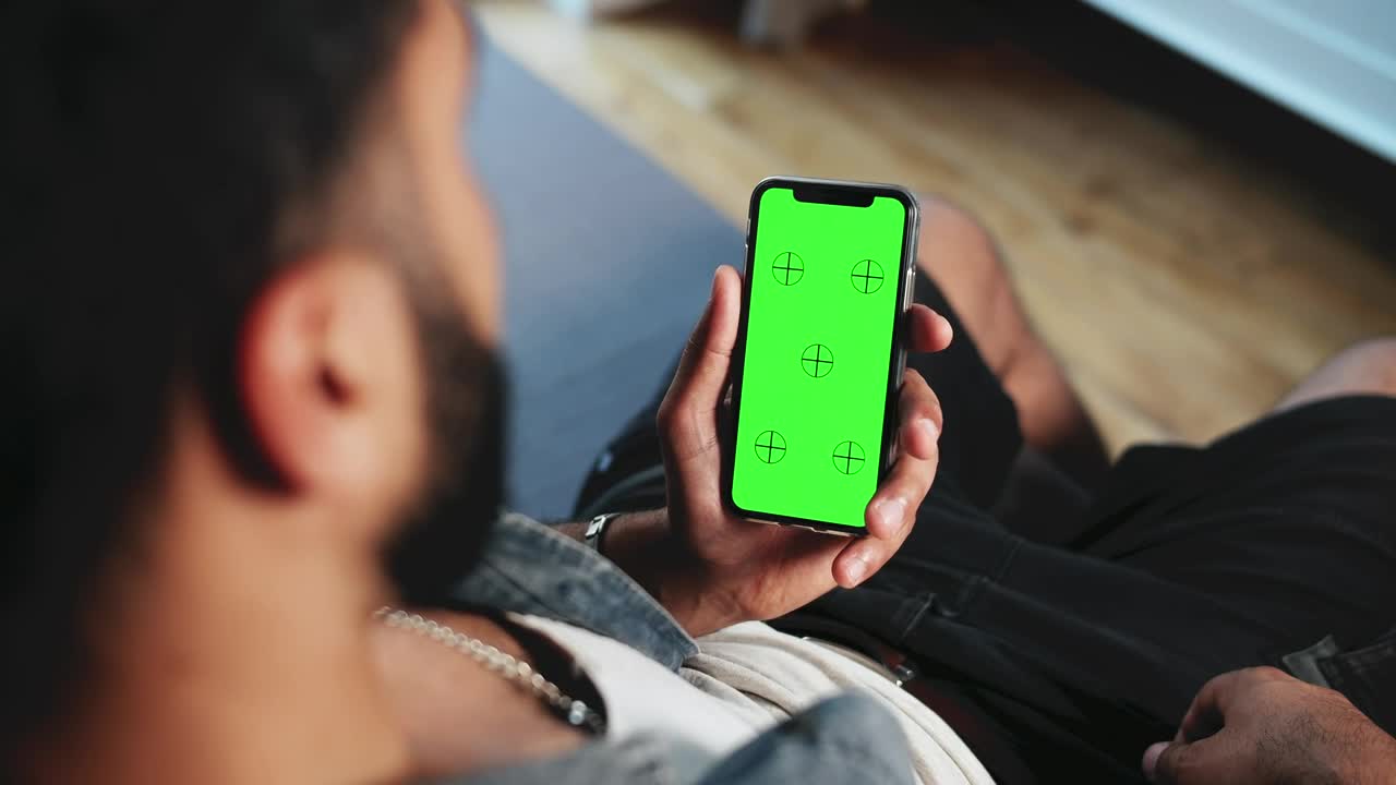 Stock Video Man Browsing Website On Mobile Greenscreen Animated Wallpaper